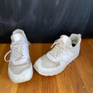 New Balance 574’s white sneakers
